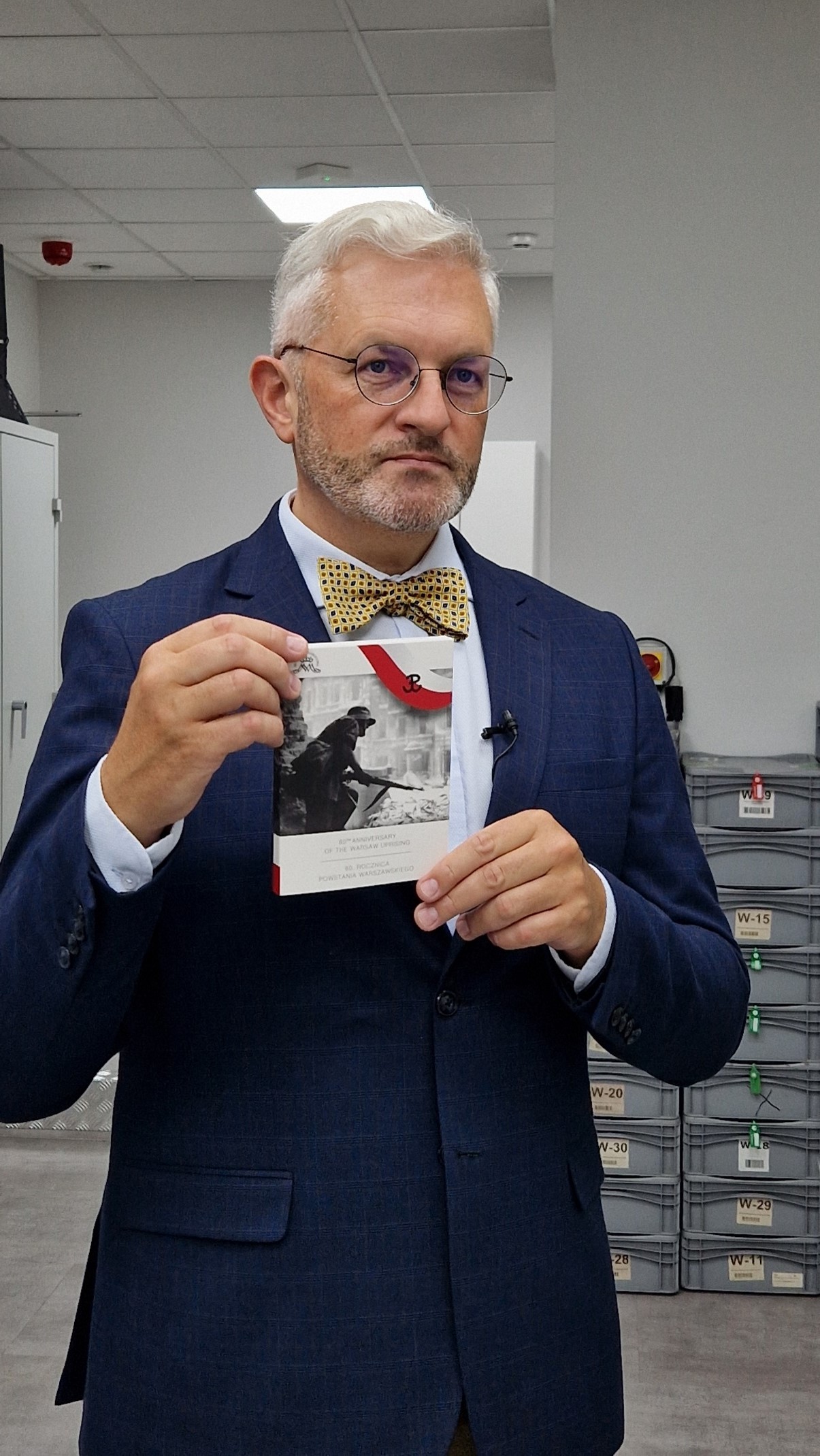 folder monety upamiętniającej Powstanie Warszawskie