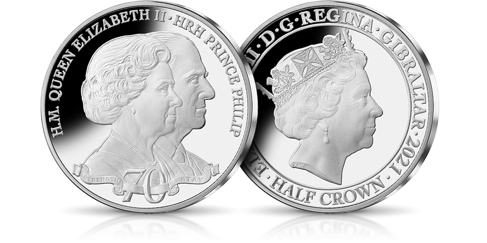 Brytyjska para królewska na srebrnej monecie.