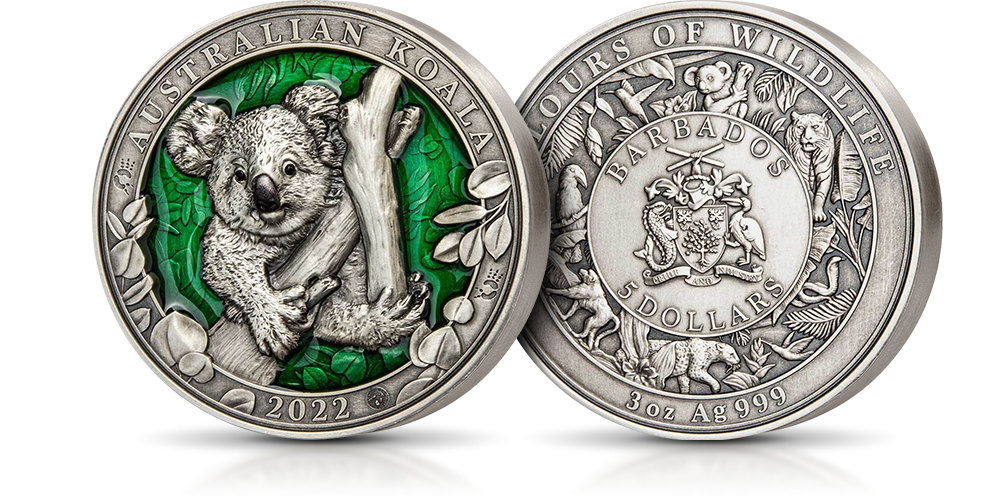 Koala na srebrnej monecie z zieloną emalią. Koala na srebrnej monecie z zieloną emalią.